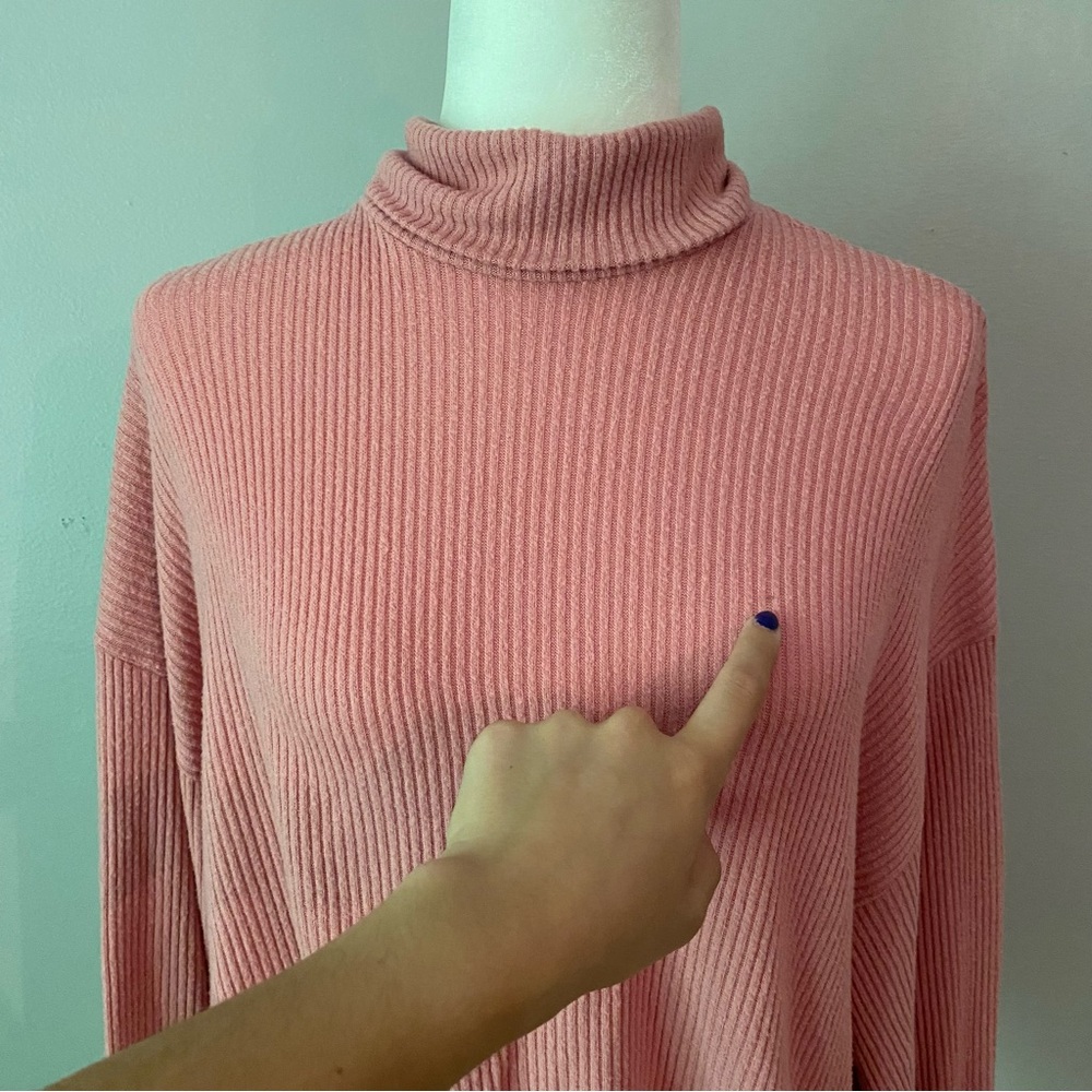 Pink turtleneck sweater